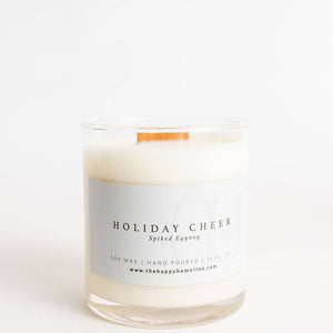 Candle labeled 'Holiday Cheer' on a white background