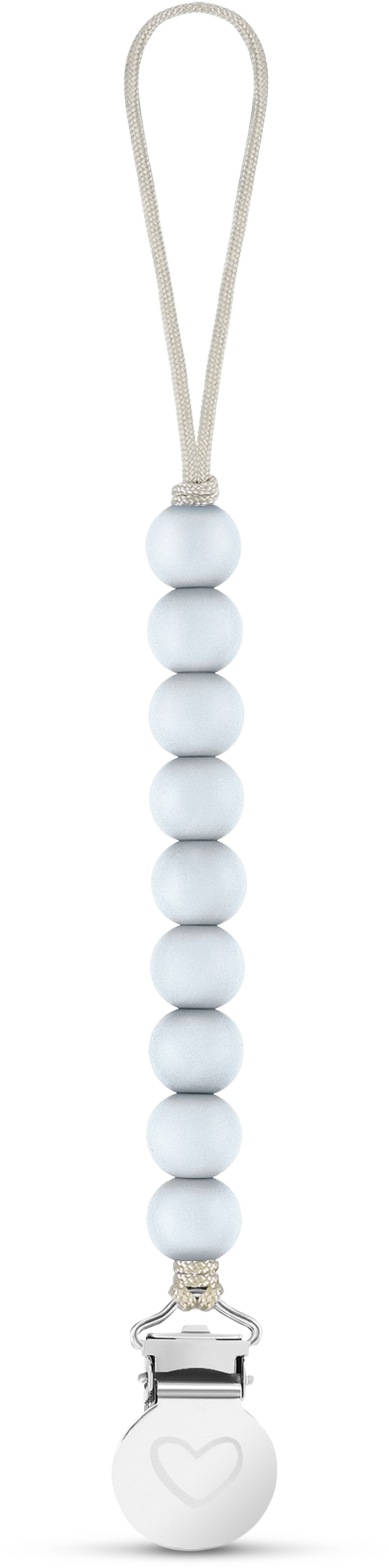 Baby sitting on a couch with a person holding a white pacifier and blue teething ring.