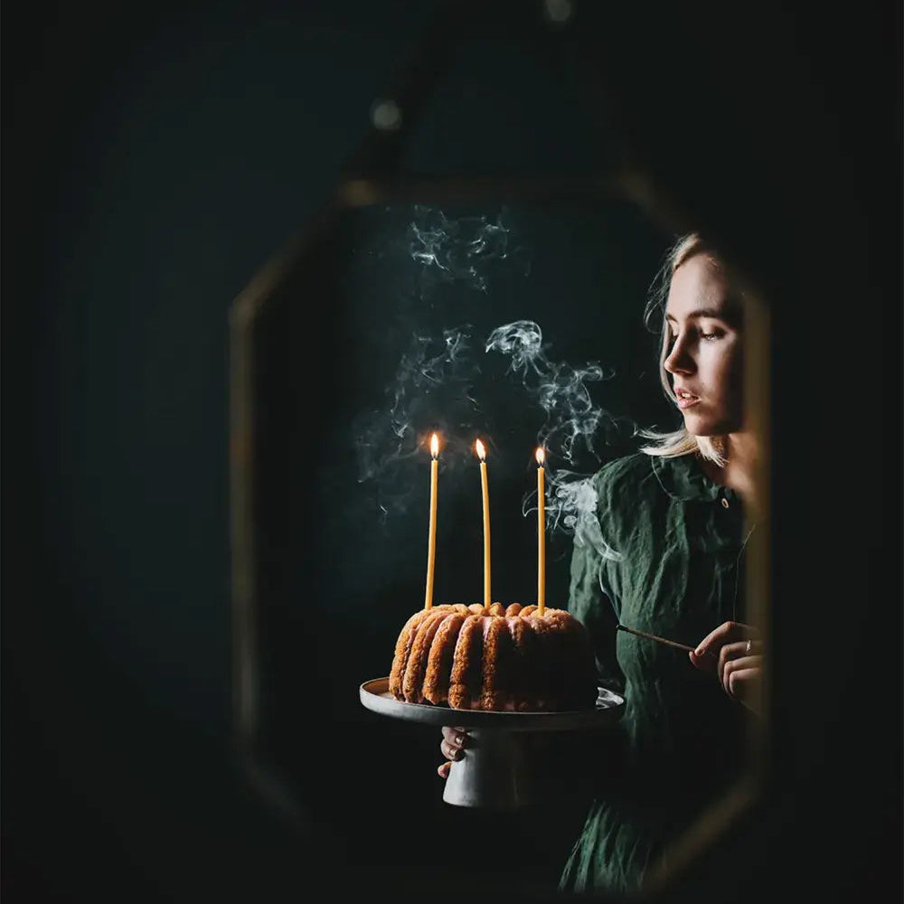 Cookbook titled 'Nordic Winter' with a cover featuring a dark scene with food and candles.