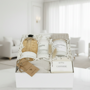 Gift set with skincare products and bath items in a box