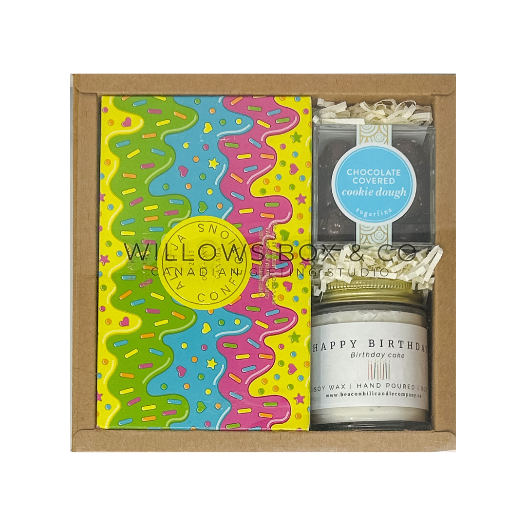 Happy Birthday gift set with candle, colorful chocolate bar and Sugarfina Cookie Dough Chocolate.