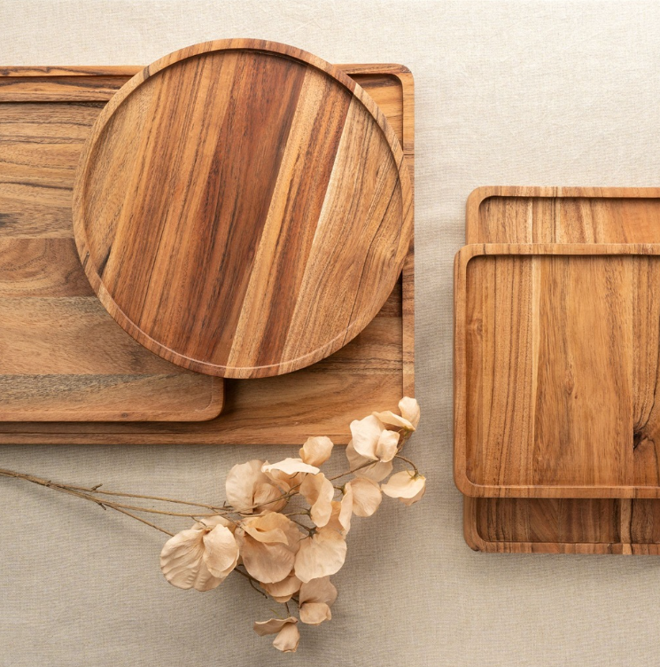 Wooden tray with a natural finish on a white background