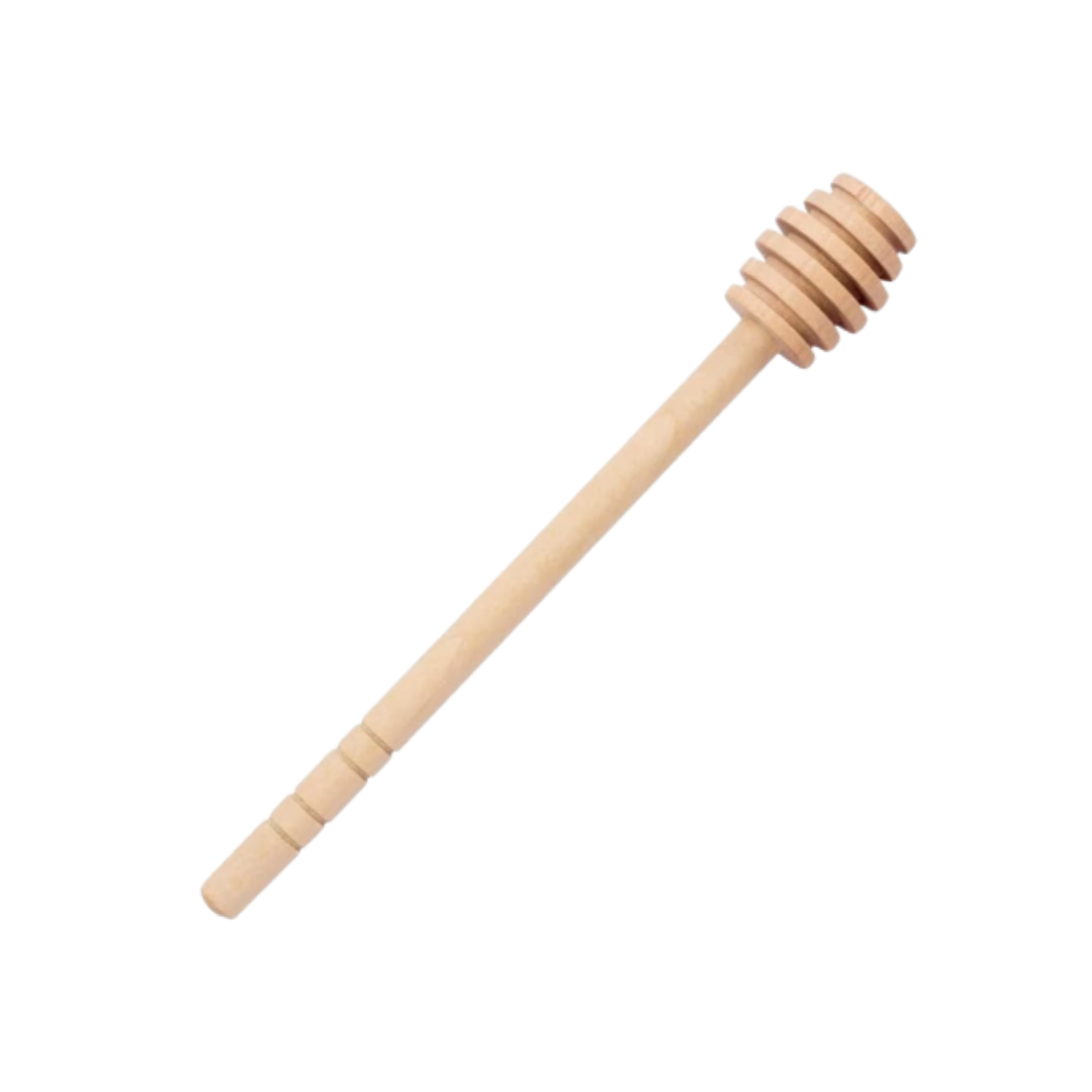 Wooden honey dipper on a white background