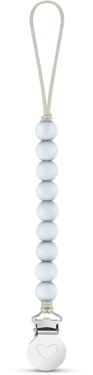 White pacifier clip with heart-shaped charm on a white background