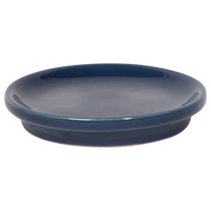Blue ceramic saucer on a white background