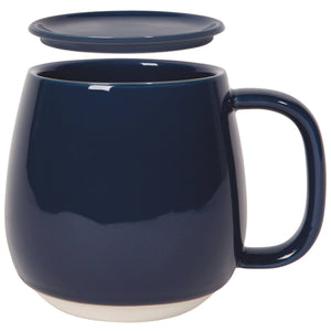Navy blue mug with a matching lid on a white background