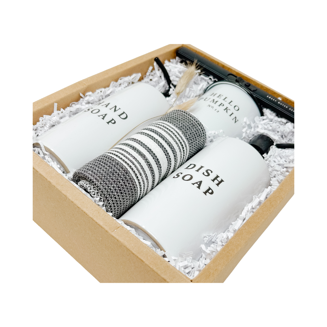 Set of hand soap, dish soap, and a towel in a decorative box with 'Hello Pumpkin' branding.