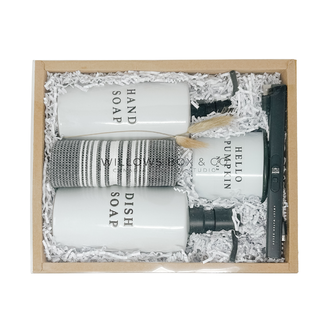 Set of kitchen products including hand & dish soap dispenser, dishcloth, and  hello pumpkin candle with a re-chargable lighter in a kraft box.