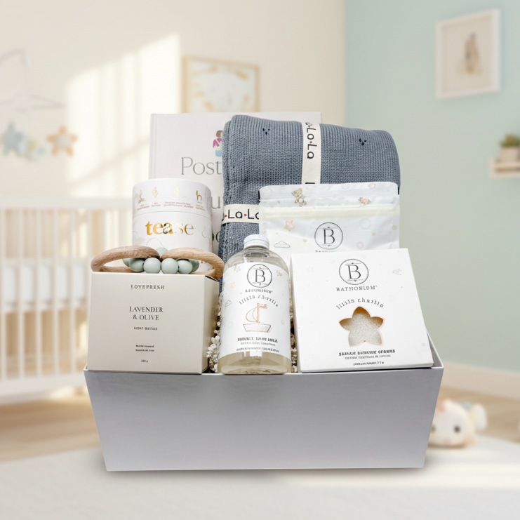 Gift box with bath products on a wooden table in a bathroom setting