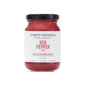 Jar of red pepper jelly from Provisions Food Company on a white background