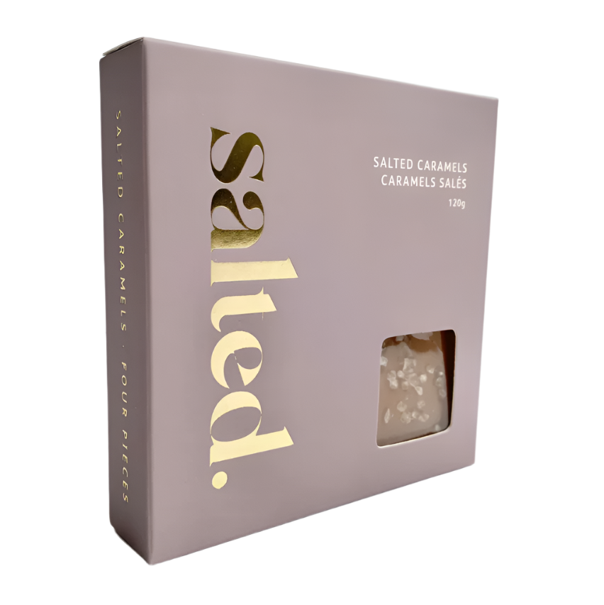 Box of salted caramels with 'salted' branding on a light gray background