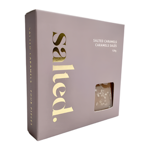 Box of salted caramels with 'salted' branding on a light gray background