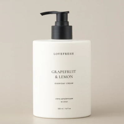 Lovefresh Grapefruit & Lemon Everyday Cream bottle on a beige background