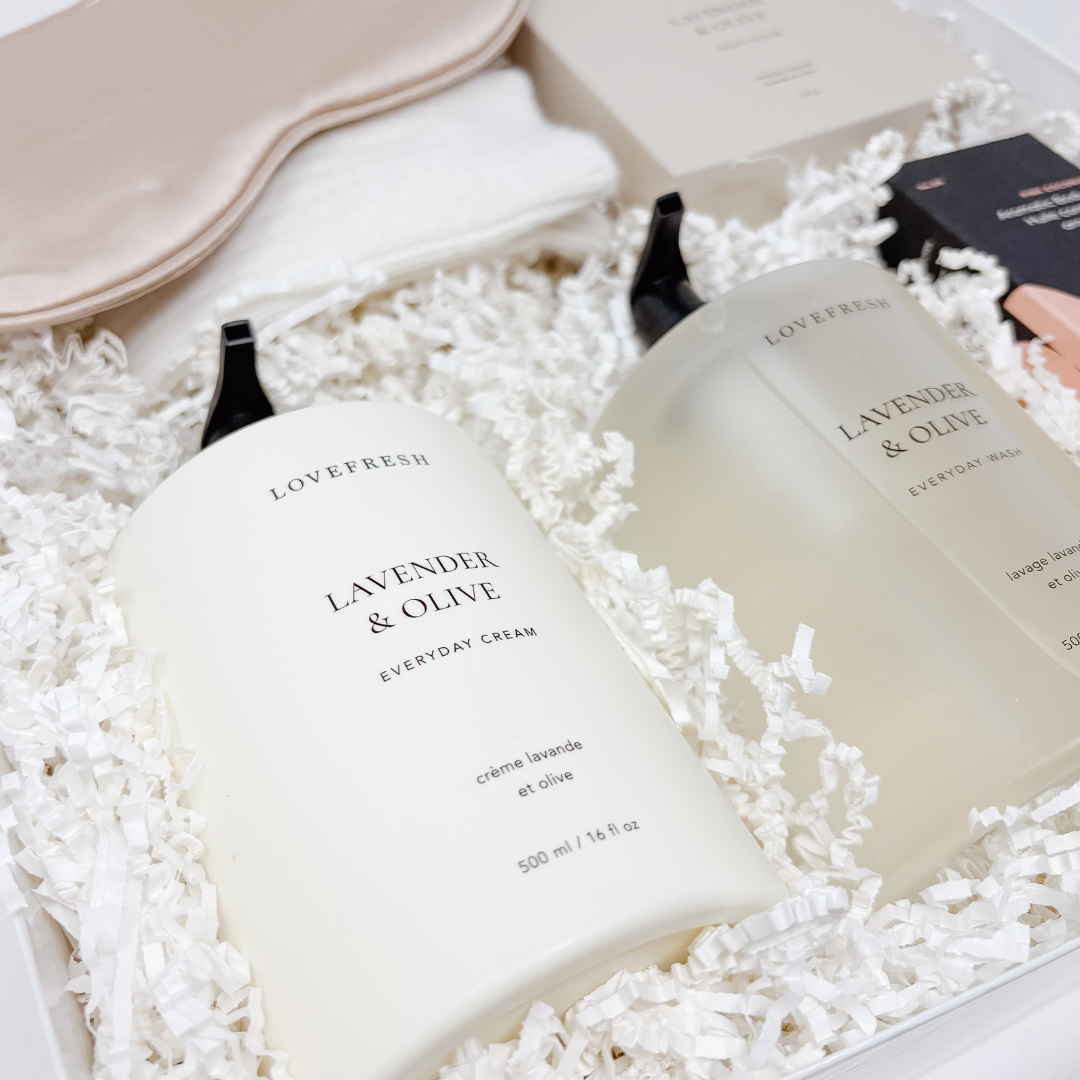 Two bottles of Lovefresh Lavender & Olive Everyday Cream in a box with white crinkle paper.
