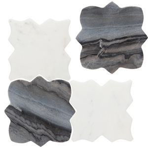 Four stone-patterned coasters on a white background