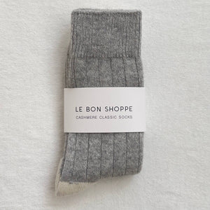 Gray cashmere sock with 'Le Bon Shoppe' label on a light gray background