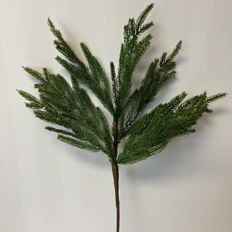 Artificial green plant stem on a white background